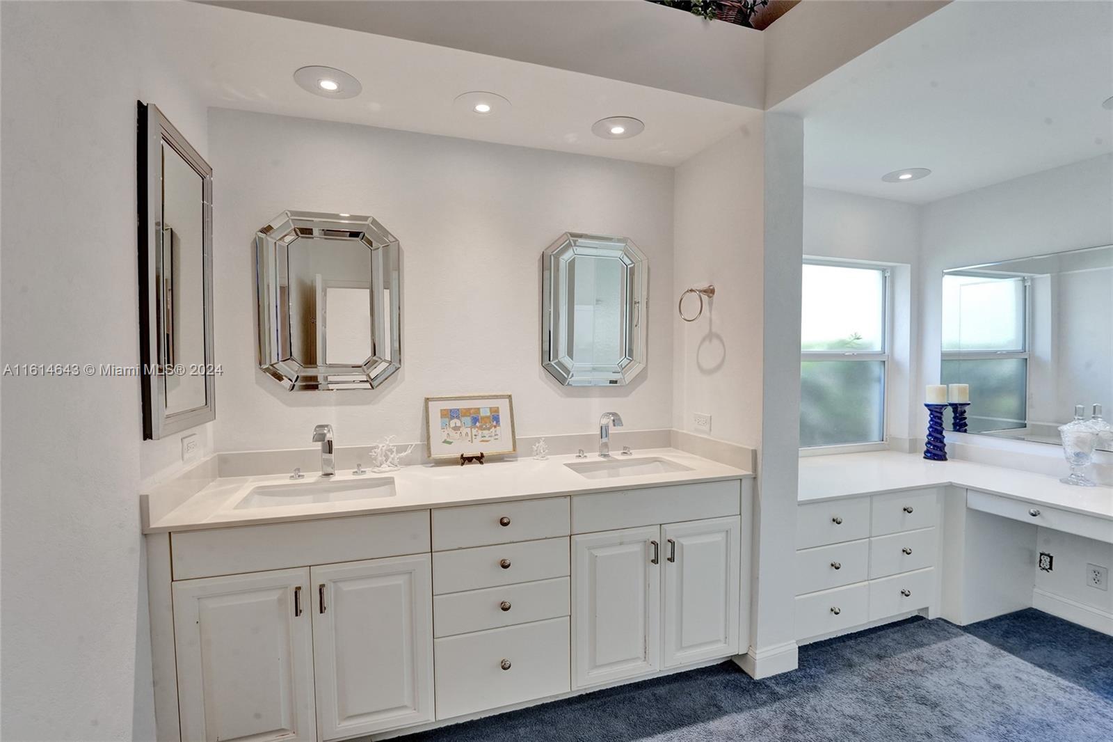 17269 Balboa Point Way Boca Raton, FL 33487 - Photo 25 of 41 a spacious en suite bathroom with double mirrors and mirrors