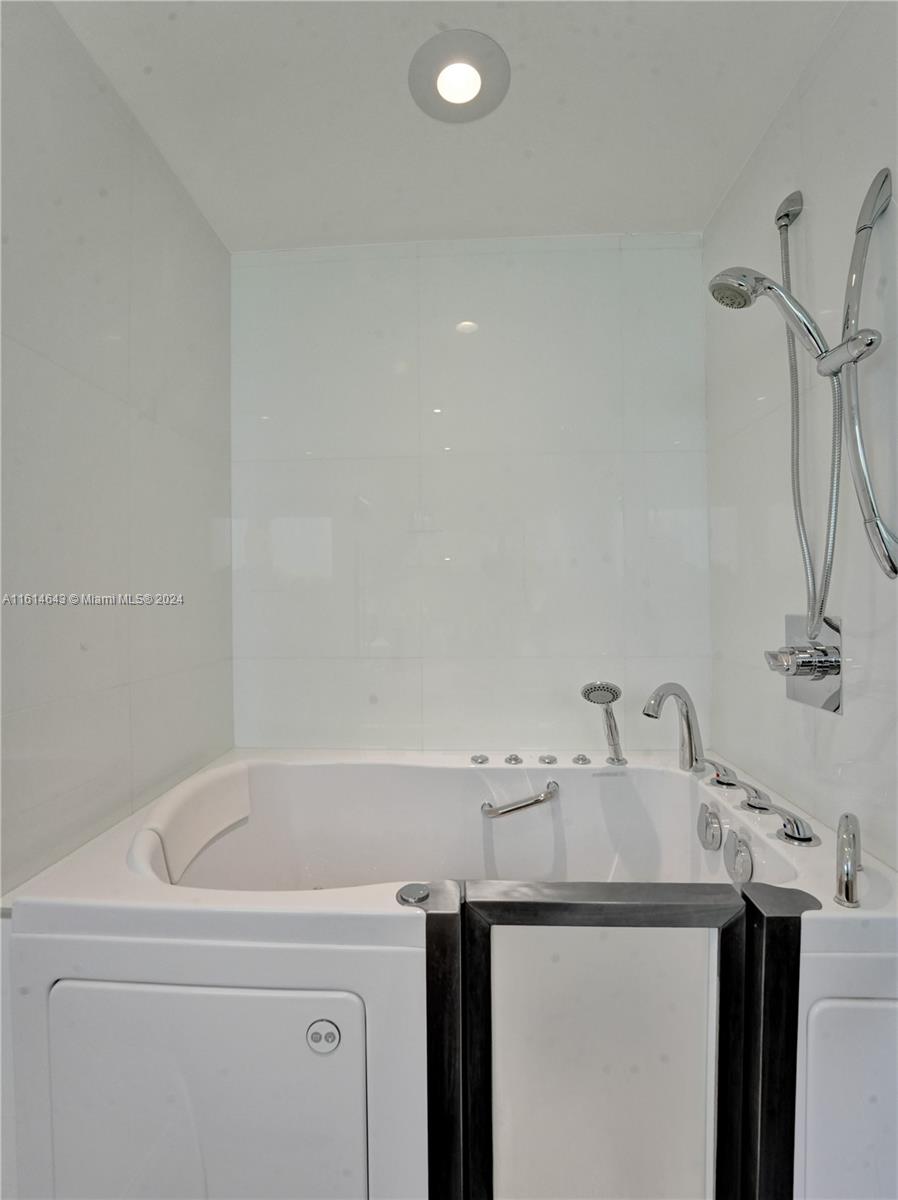 17269 Balboa Point Way Boca Raton, FL 33487 - Photo 27 of 41 a bathroom with a sink and a vanity