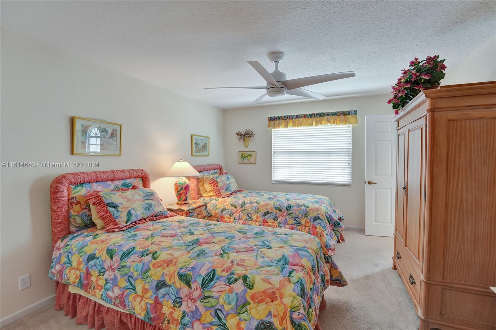 17269 Balboa Point Way Boca Raton, FL 33487 - Photo 28 of 41 a bedroom with bed and window