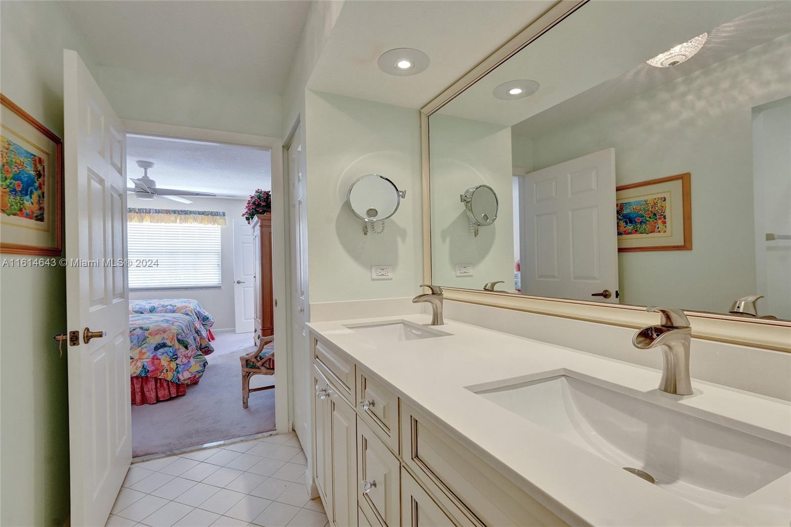 17269 Balboa Point Way Boca Raton, FL 33487 - Photo 29 of 41 a bathroom with a sink double vanity