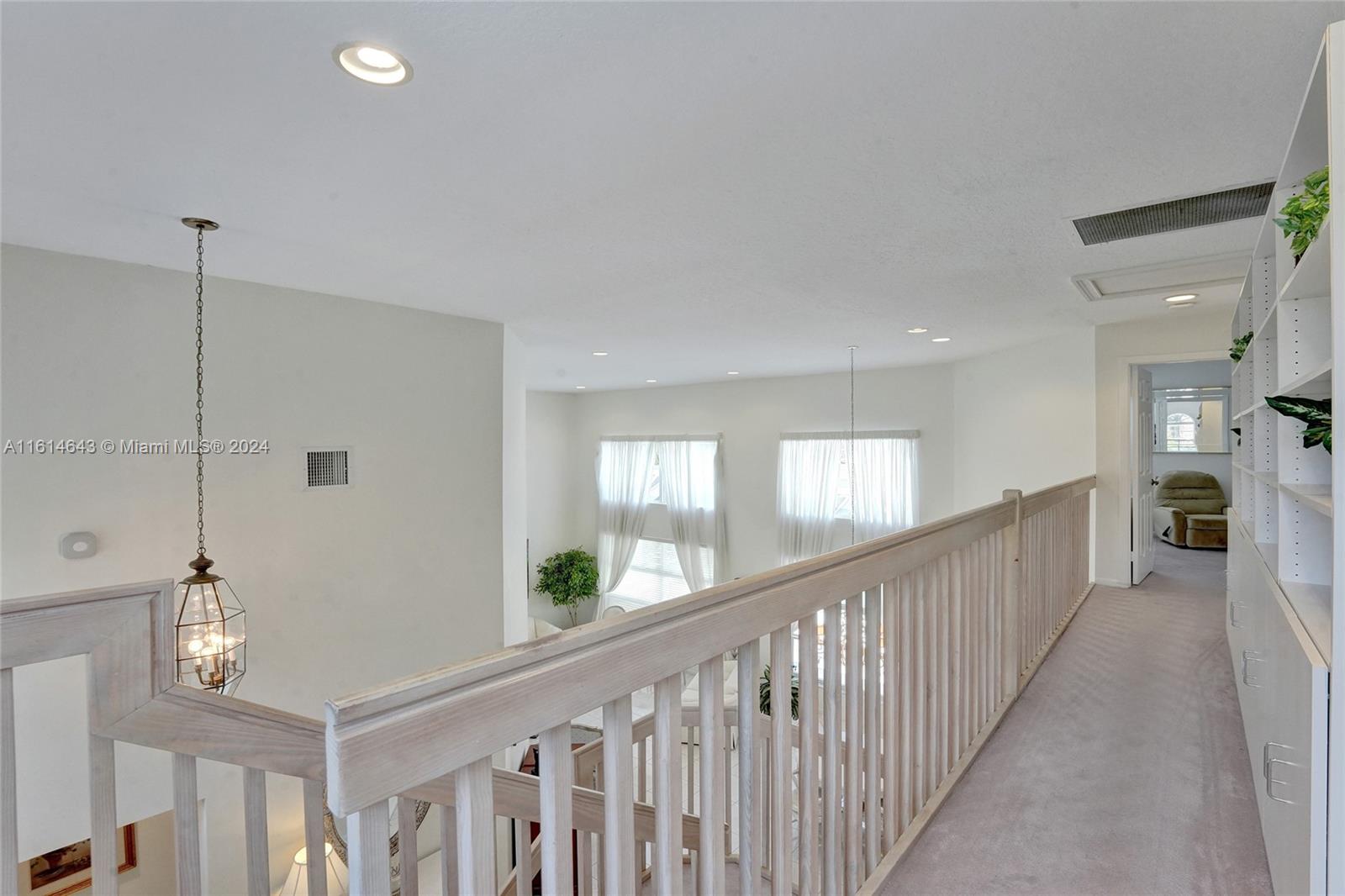 17269 Balboa Point Way Boca Raton, FL 33487 - Photo 33 of 41 a view of a hallway view with staircase