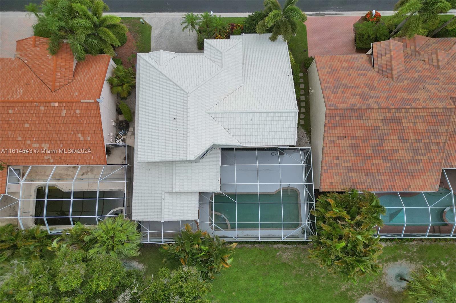 17269 Balboa Point Way Boca Raton, FL 33487 - Photo 37 of 41 aerial view of a house with a yard and potted plants