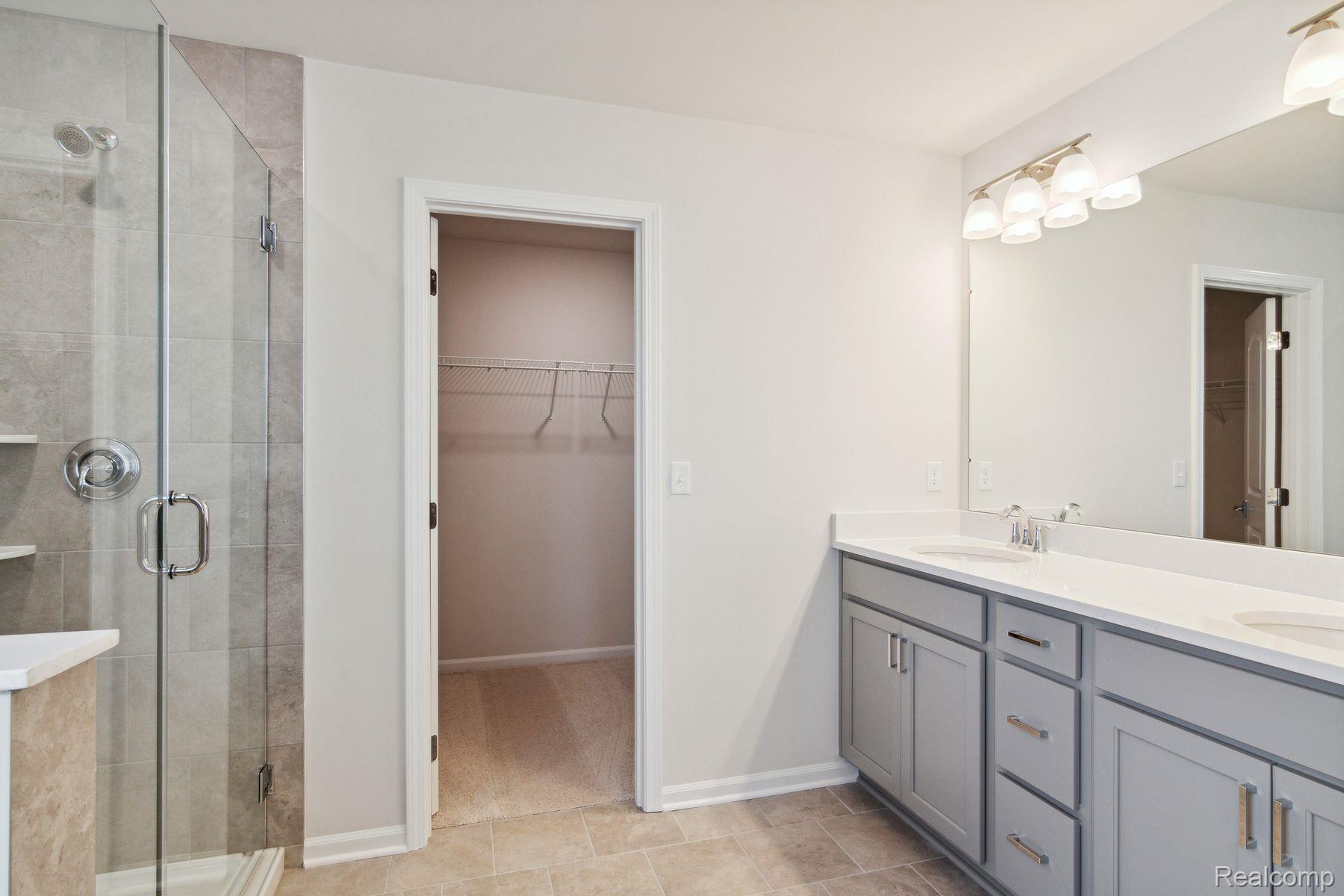2734 Maize Loop Saline, MI 48176 - Photo 29 of 42 Owner's Bathroom