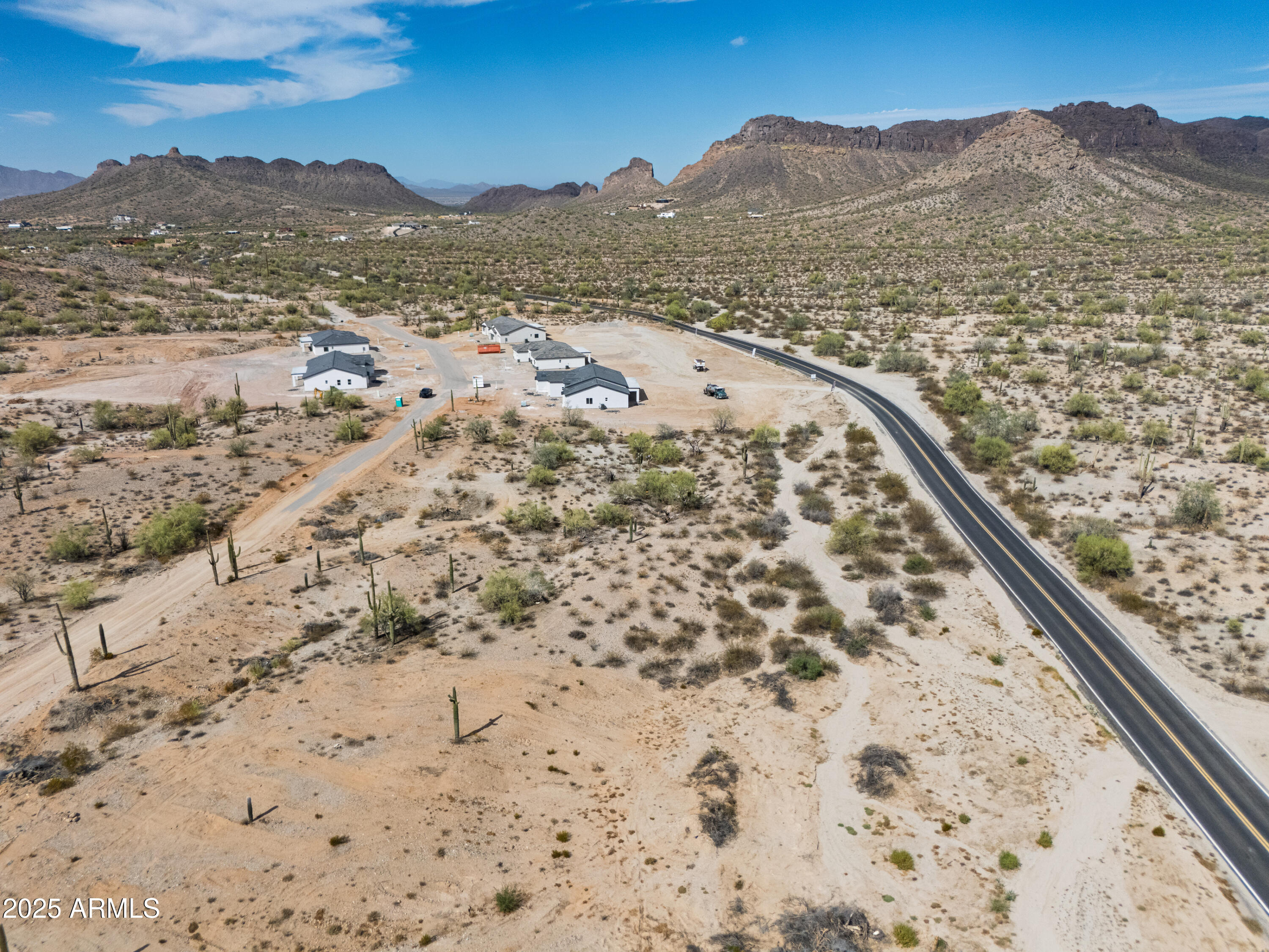 0 North Brenner Pass Road, Unit G Queen Creek, AZ 85144 - Photo 12 of 20 a view of mountain with wooden floor and mountains in the background