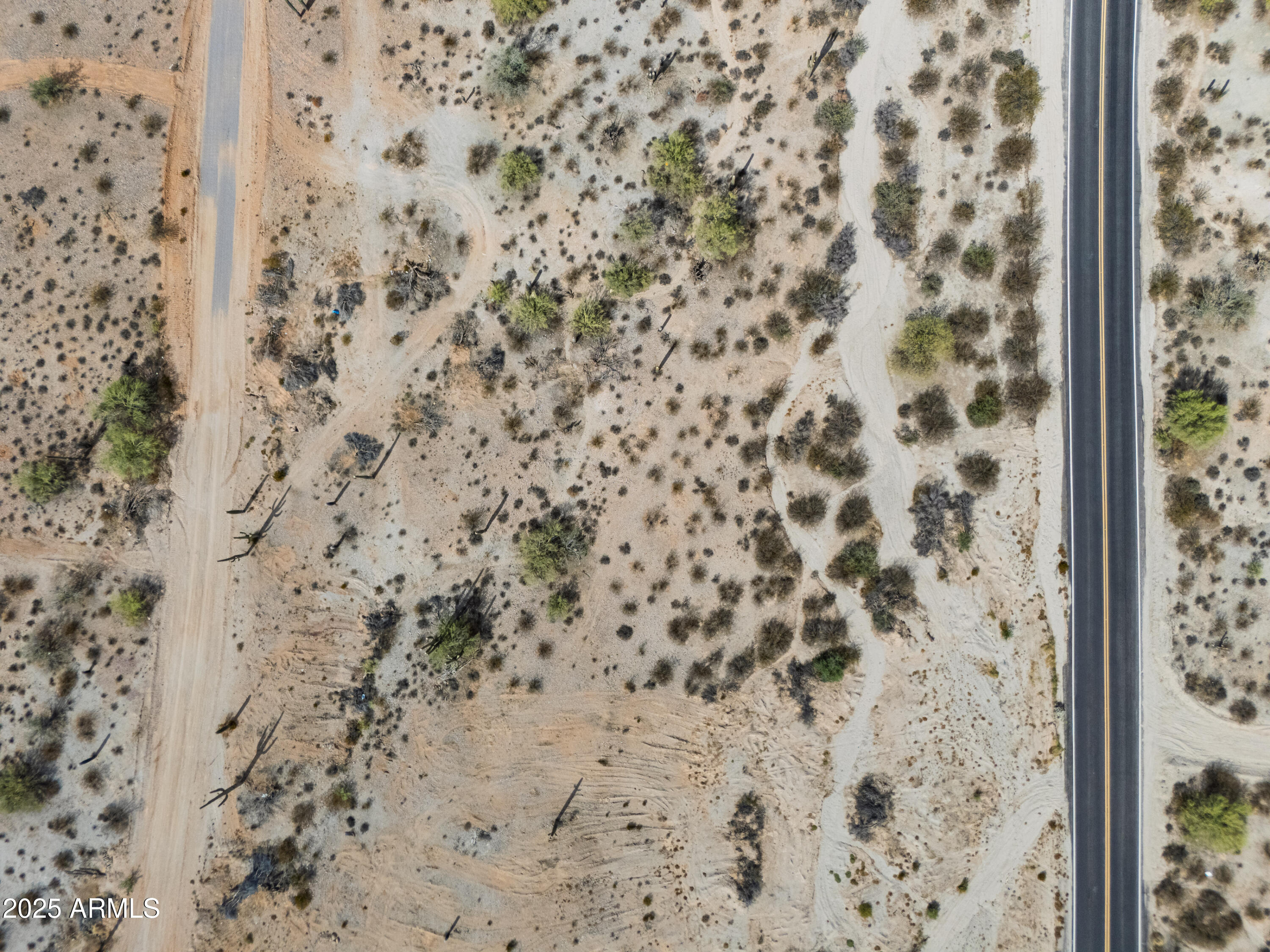 0 North Brenner Pass Road, Unit G Queen Creek, AZ 85144 - Photo 14 of 20 a bathroom with a shower curtain