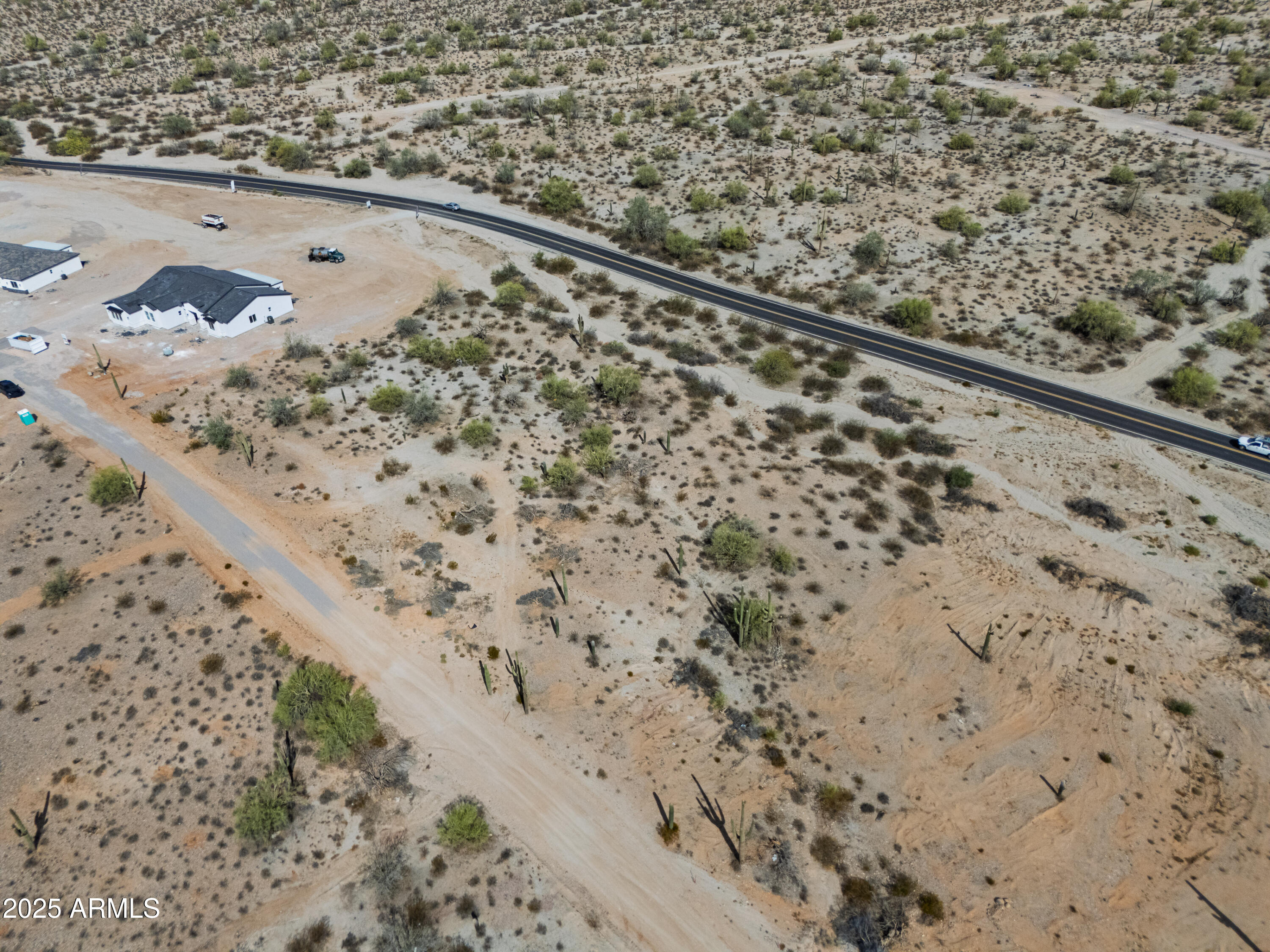 0 North Brenner Pass Road, Unit G Queen Creek, AZ 85144 - Photo 4 of 20 a view of a large window with snow on the ground