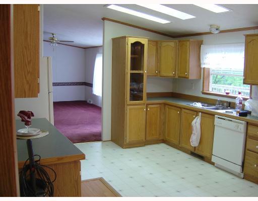 Exterior Front. Large kitchen area leading into the family room