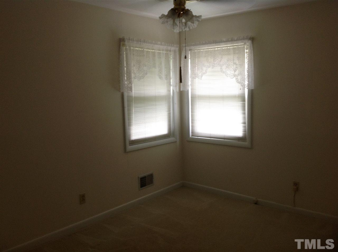145 Creech Road Garner, NC 27529 - Photo 13 of 15 a room that has a window in it