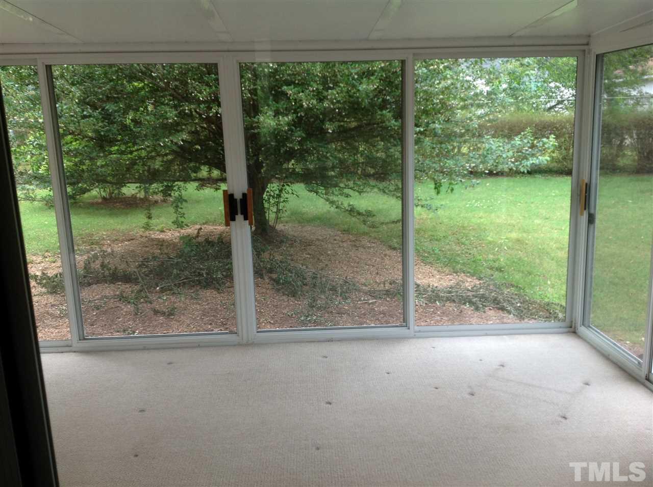 145 Creech Road Garner, NC 27529 - Photo 9 of 15 a view of a room with a large window