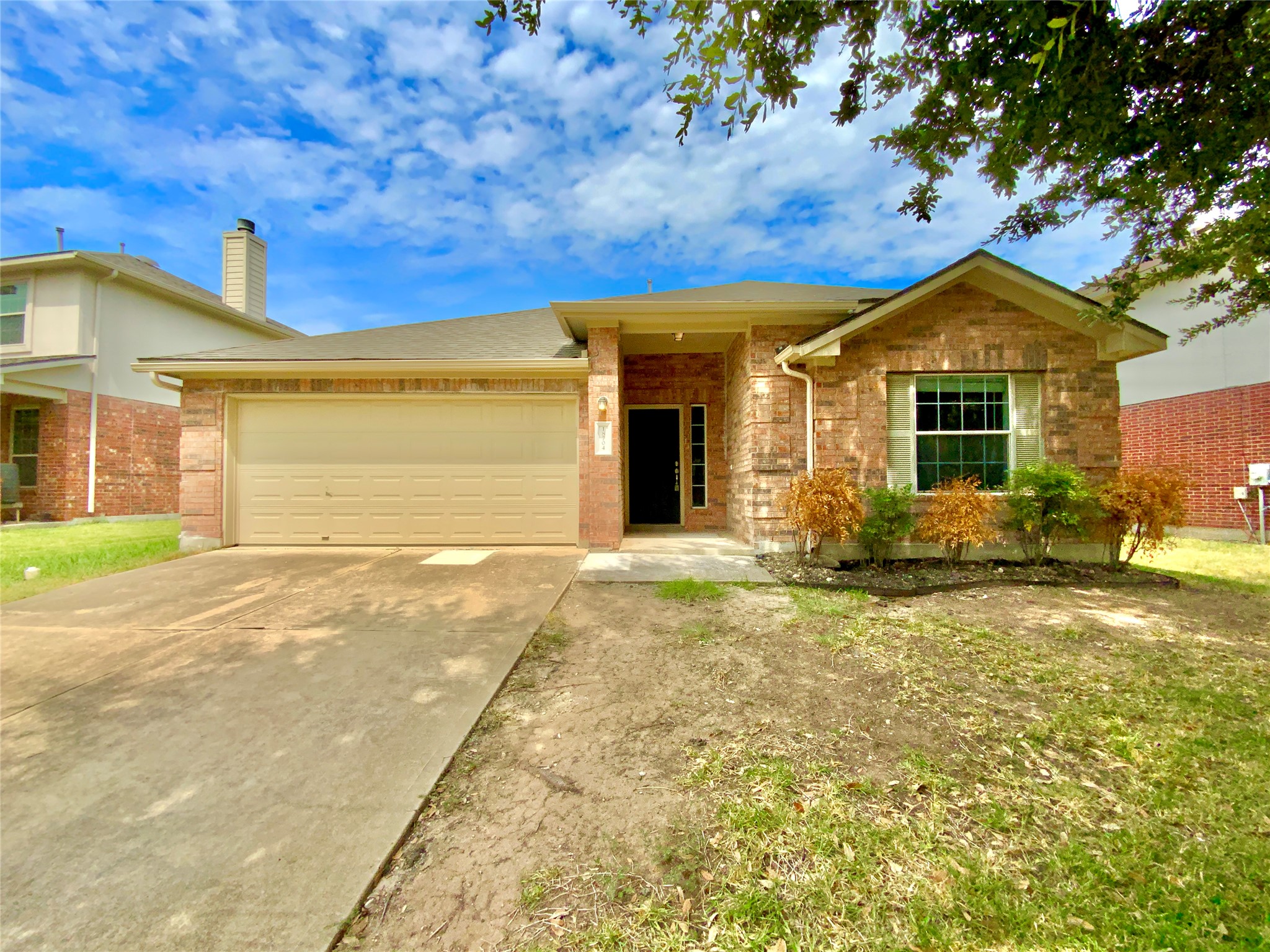 18704 Silent Water Way Pflugerville, TX 78660 - Photo 1 of 14 a view of a house with a backyard and a tree