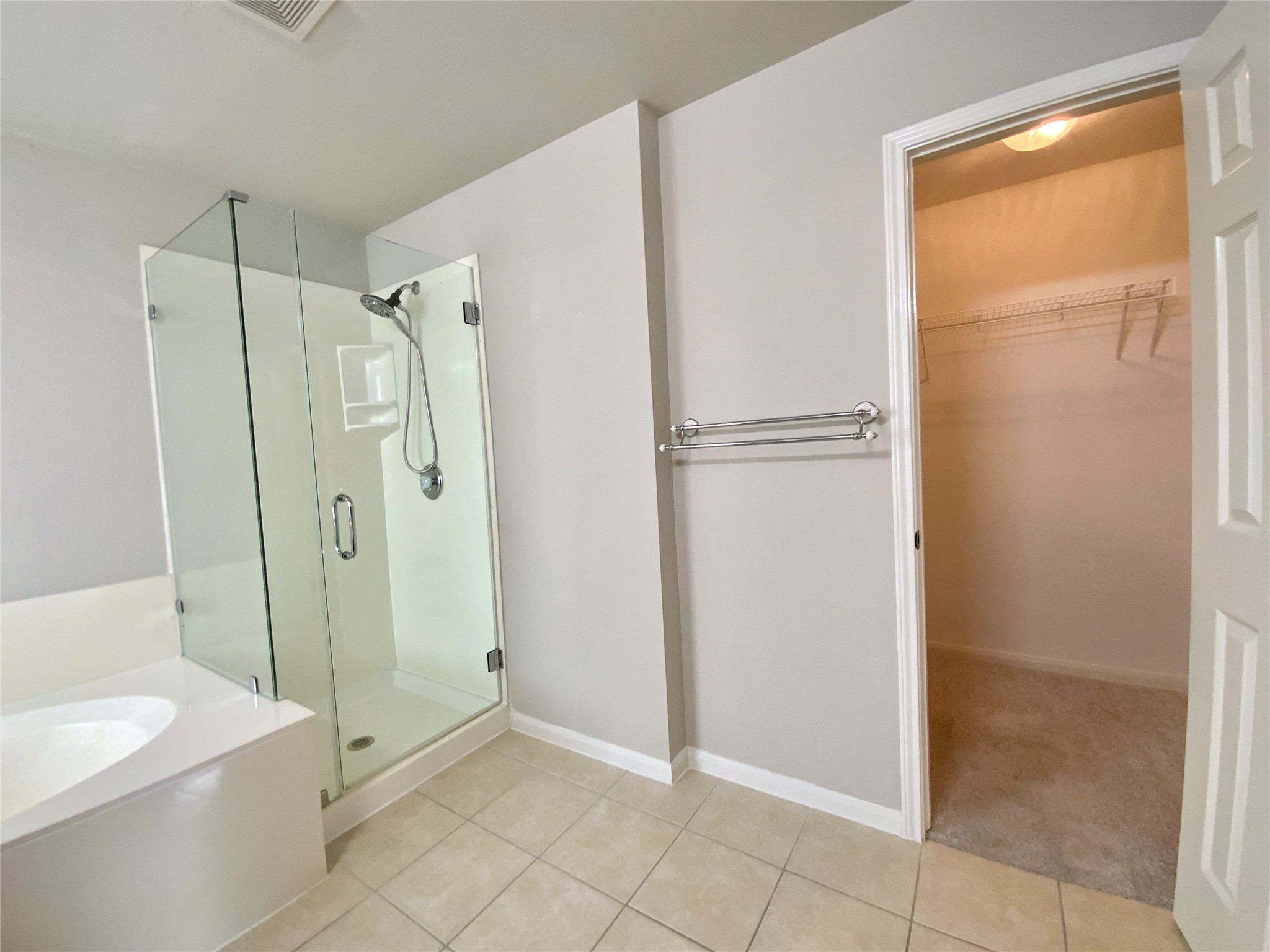 18704 Silent Water Way Pflugerville, TX 78660 - Photo 11 of 14 a bathroom with a shower and a sink