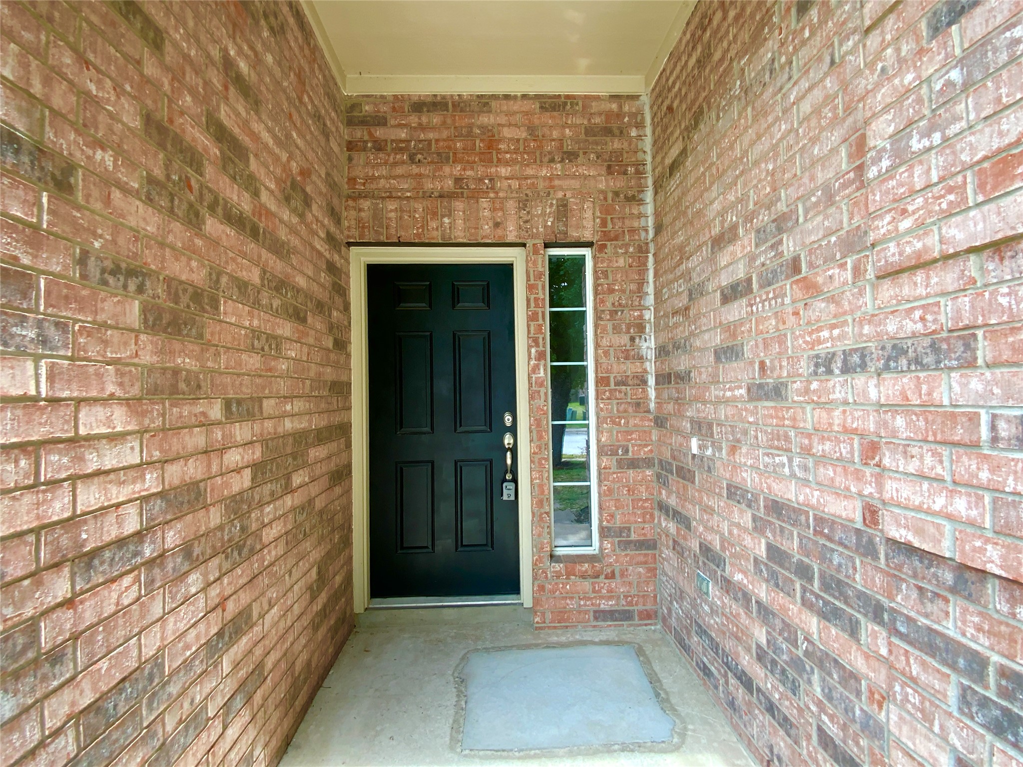 18704 Silent Water Way Pflugerville, TX 78660 - Photo 2 of 14 a view of front door of a house with an entrance