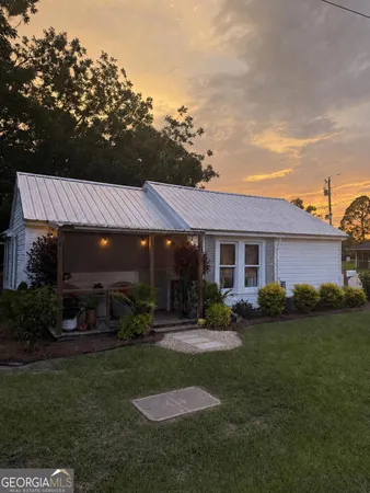 a view of a house with a patio