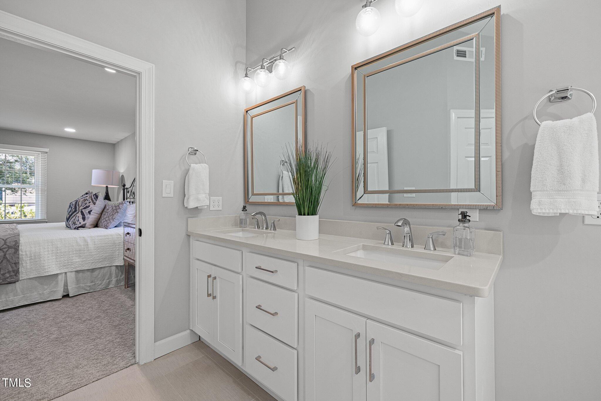 1113 Winterwind Place Raleigh, NC 27615 - Photo 28 of 49 Ensuite Primary Bathroom