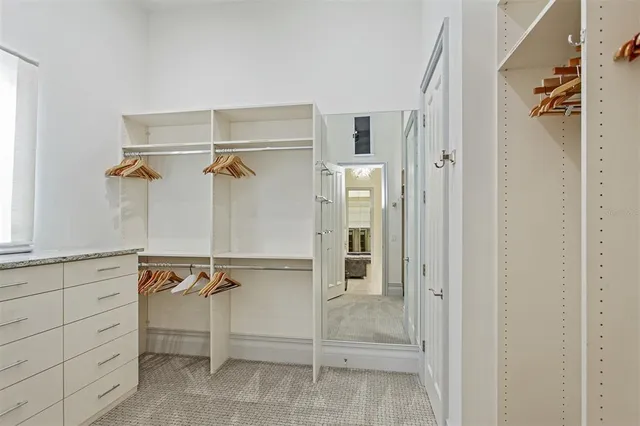 a bathroom with a sink toilet a mirror and shower
