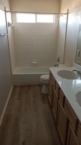 a kitchen with a sink a stove and refrigerator