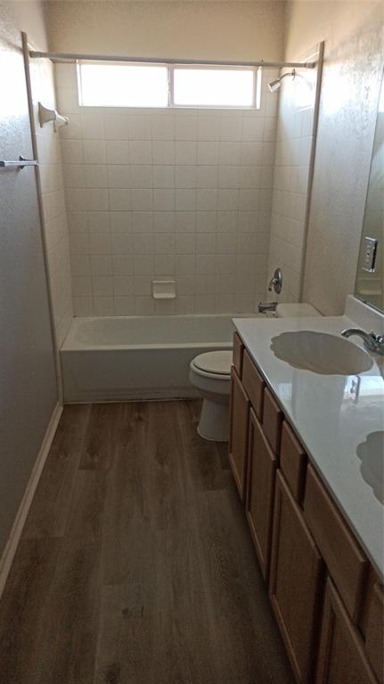 2620 Ridgebrook Court Mesquite, TX 75181 - Photo 13 of 24 a bathroom with a sink a toilet and shower