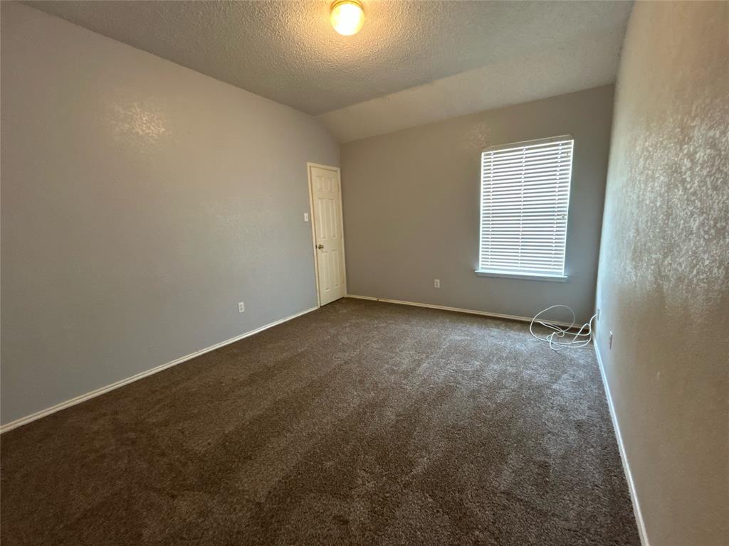 2620 Ridgebrook Court Mesquite, TX 75181 - Photo 21 of 24 an empty room with a window