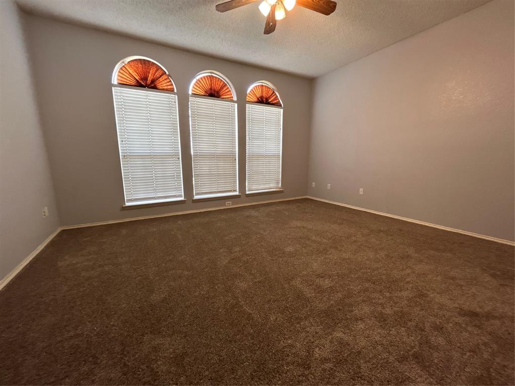 2620 Ridgebrook Court Mesquite, TX 75181 - Photo 23 of 24 an empty room with a window