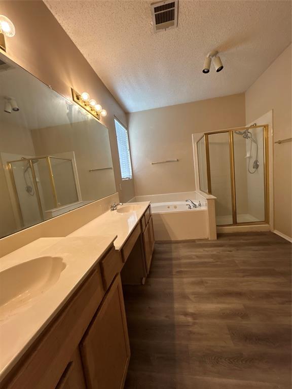 2620 Ridgebrook Court Mesquite, TX 75181 - Photo 6 of 24 a bathroom with a sink and a mirror