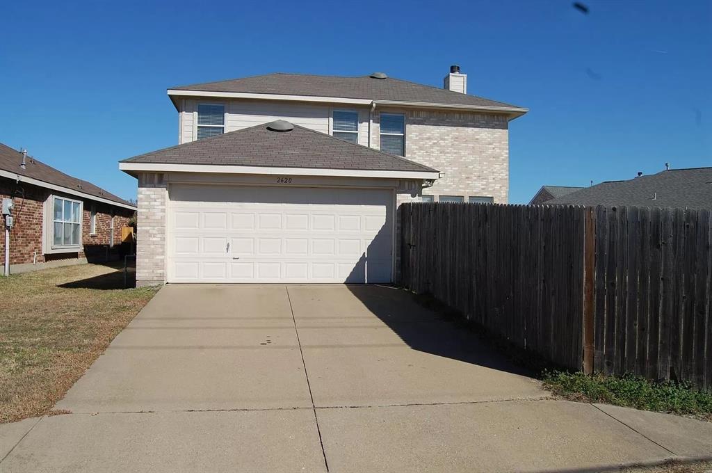 2620 Ridgebrook Court Mesquite, TX 75181 - Photo 7 of 24 a front view of a house with yard