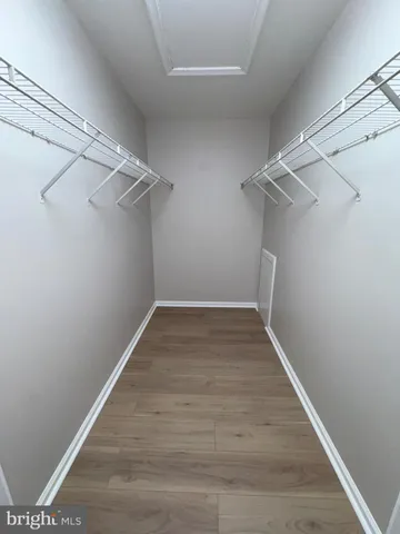 a view of a room with racks on the wall