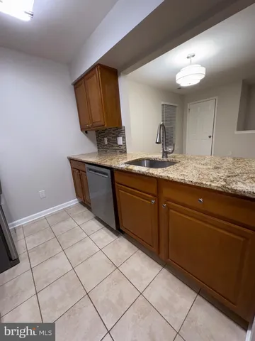 a bathroom with a sink a vanity and mirror