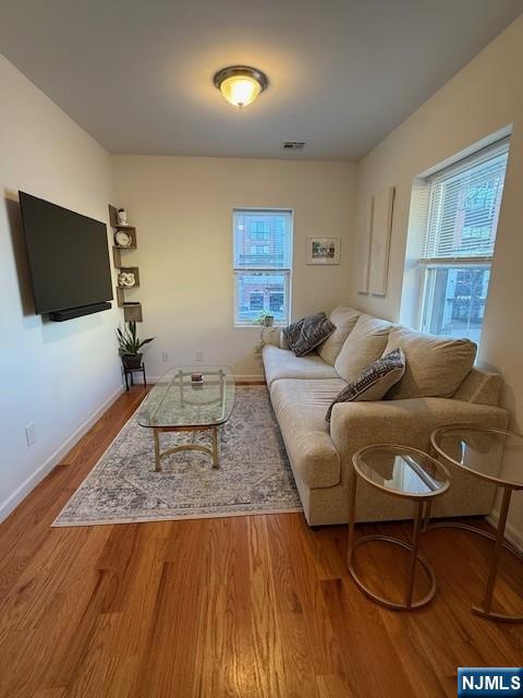 145 Kinderkamack Road Park Ridge, NJ 07656 - Photo 6 of 15 a living room with furniture and a flat screen tv