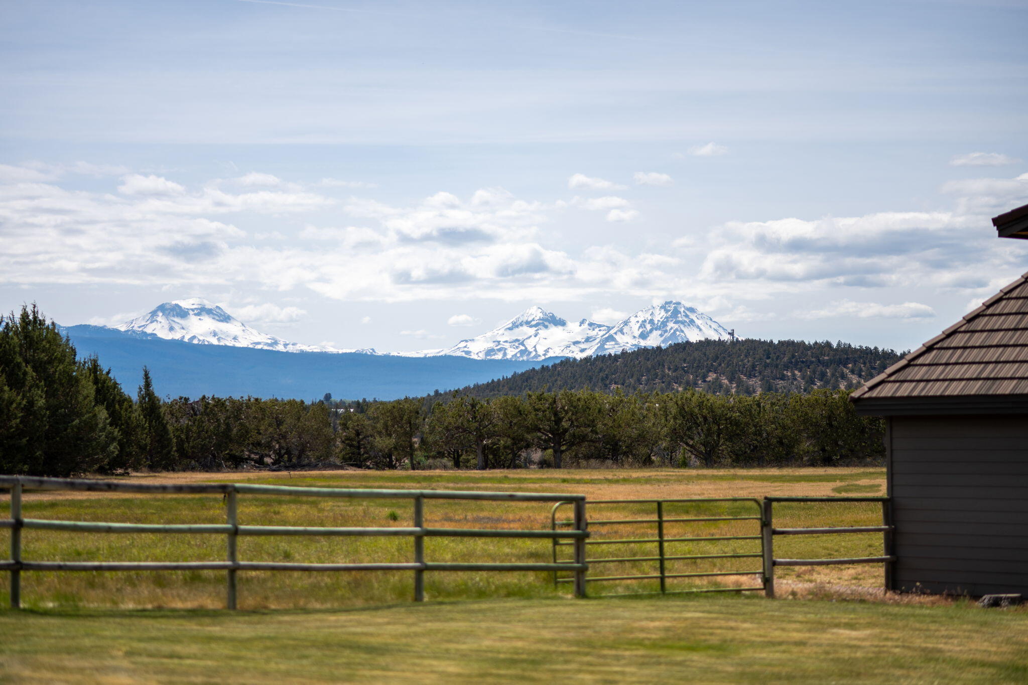 20180 Winston Loop Bend, OR 97703 - Photo 4 of 59 a view of a lake with a mountain in the background