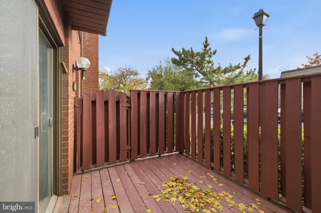 a view of a wooden fence
