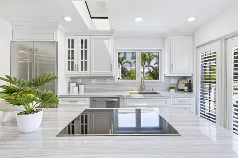 a bathroom with a double vanity sink mirror and double