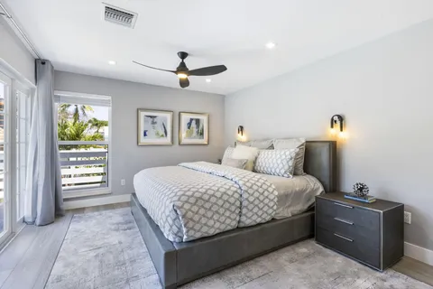 a bathroom with a shower and a sink