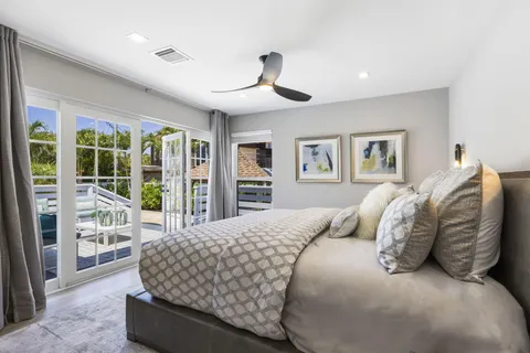 a bathroom with a sink a mirror and a shower