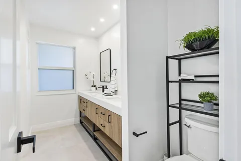 a bathroom with a sink and a shower