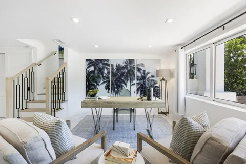 a bed room with a bed and a dresser