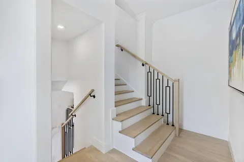 a view of a balcony with wooden floor