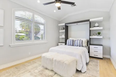 a view of a house with wooden deck