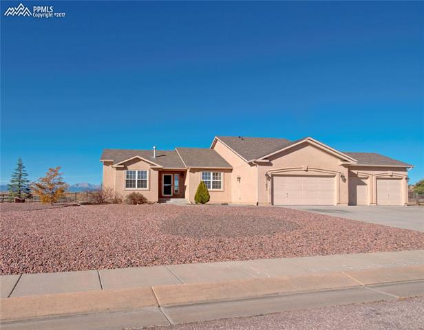 11601 Rio Secco Road Peyton, CO 80831 - Photo 2 of 36 See Pikes Peak just to the left of the front door?