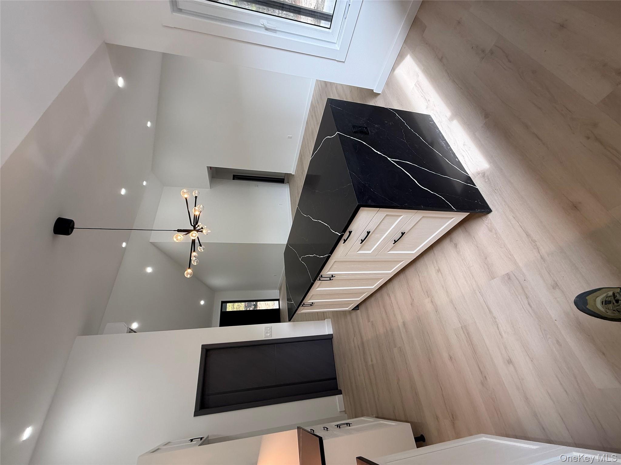 58 Dunn Town Road Wurtsboro, NY 12790 - Photo 29 of 36 a large white kitchen with a large counter top