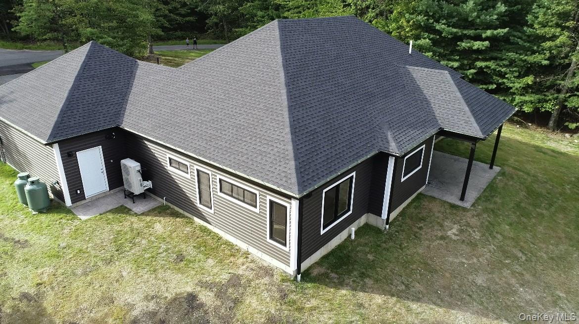 58 Dunn Town Road Wurtsboro, NY 12790 - Photo 3 of 36 a backyard of a house with seating space