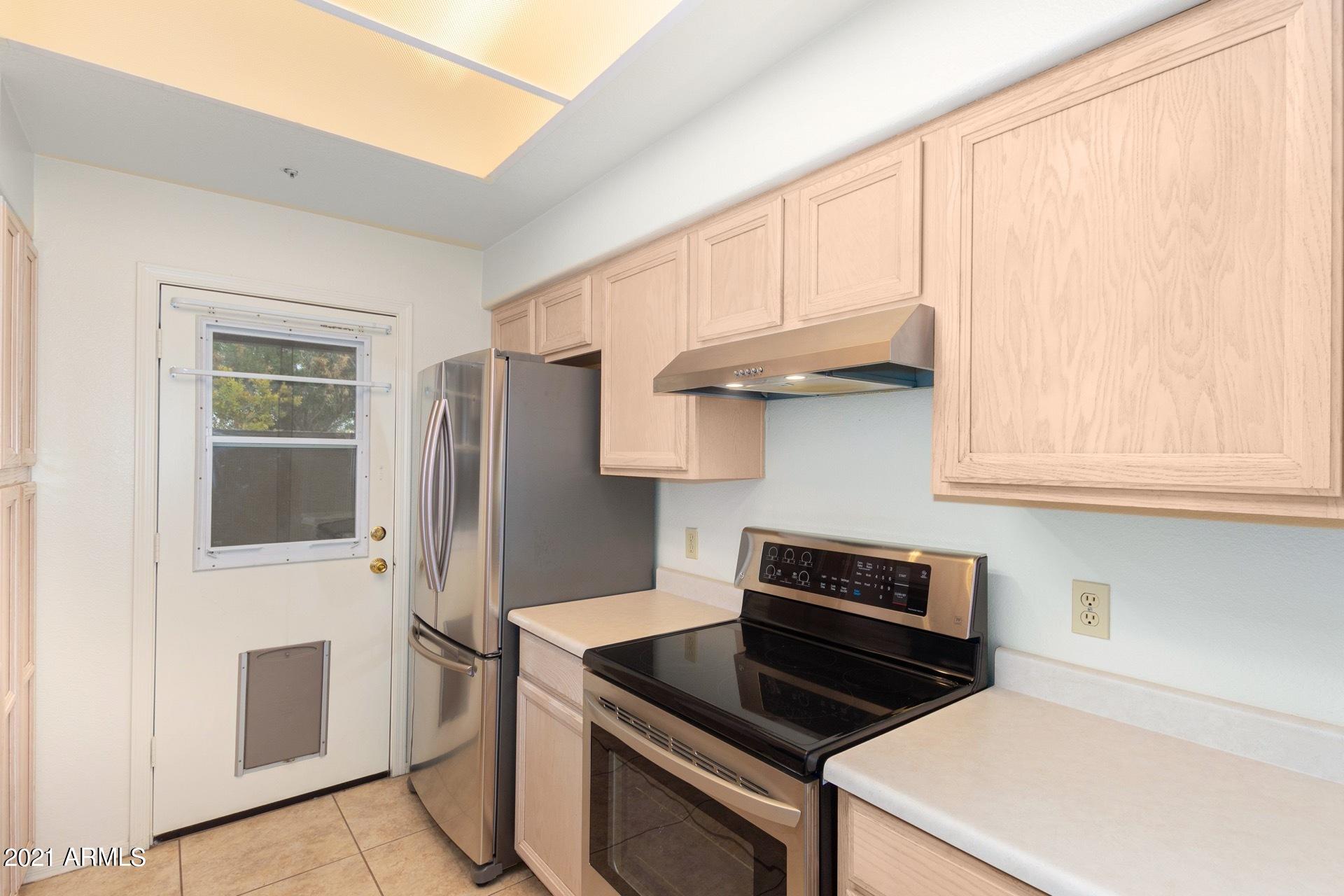 1222 West Baseline Road, Unit 136 Tempe, AZ 85283 - Photo 11 of 30 Door to Kitchen Patio