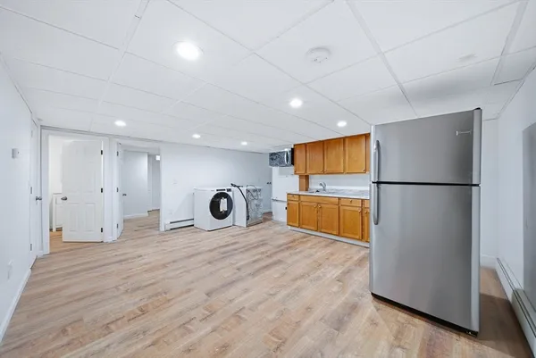 a view of a livingroom with wooden floor