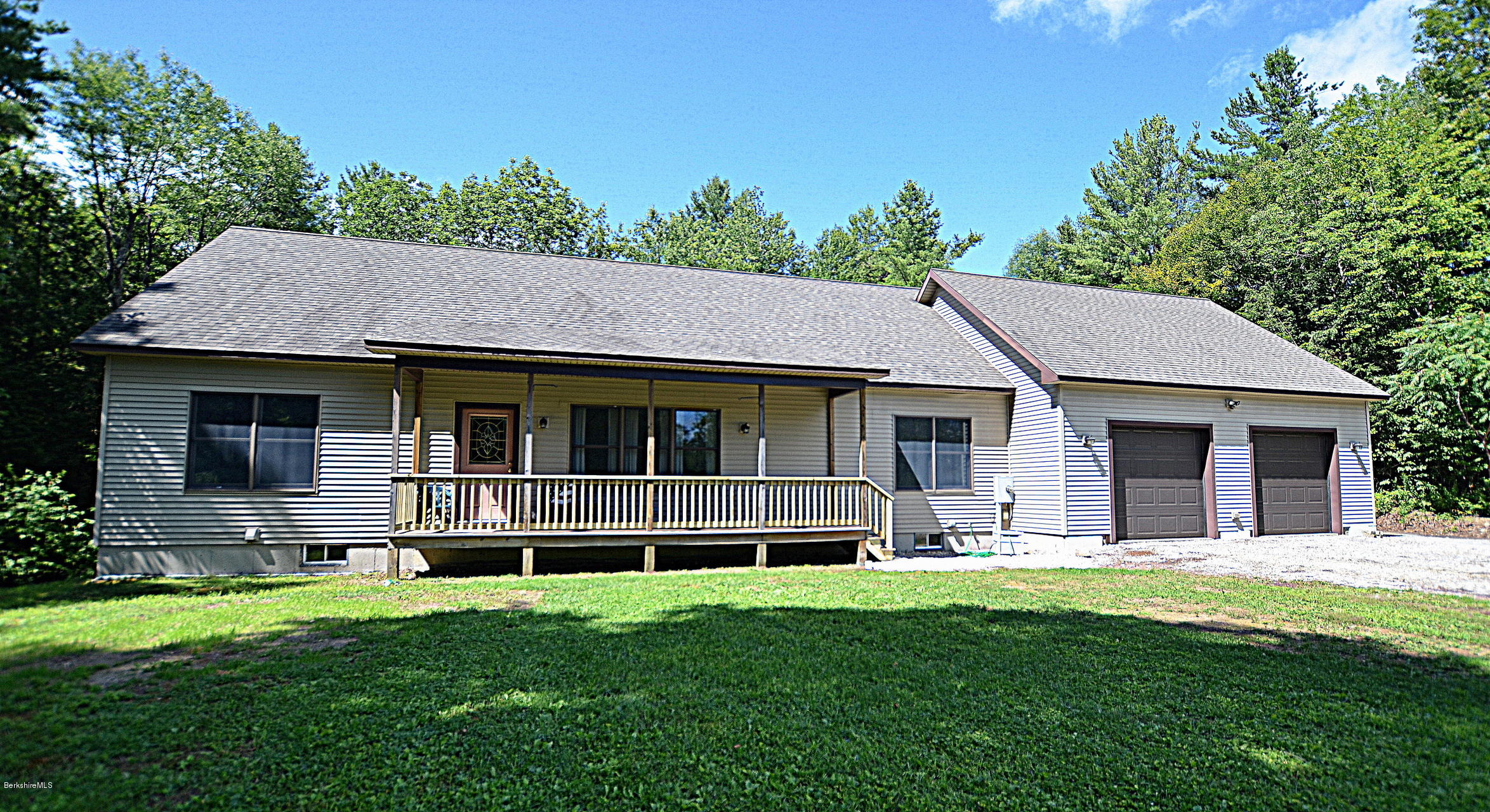 779 Stebbins Road Otis, MA 01253 - Photo 1 of 40 a aerial view of a house with a yard