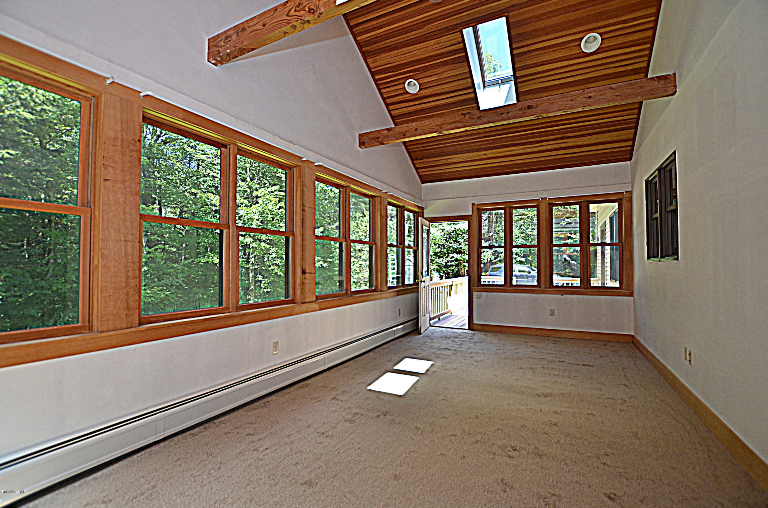 779 Stebbins Road Otis, MA 01253 - Photo 19 of 40 a view of empty room with windows