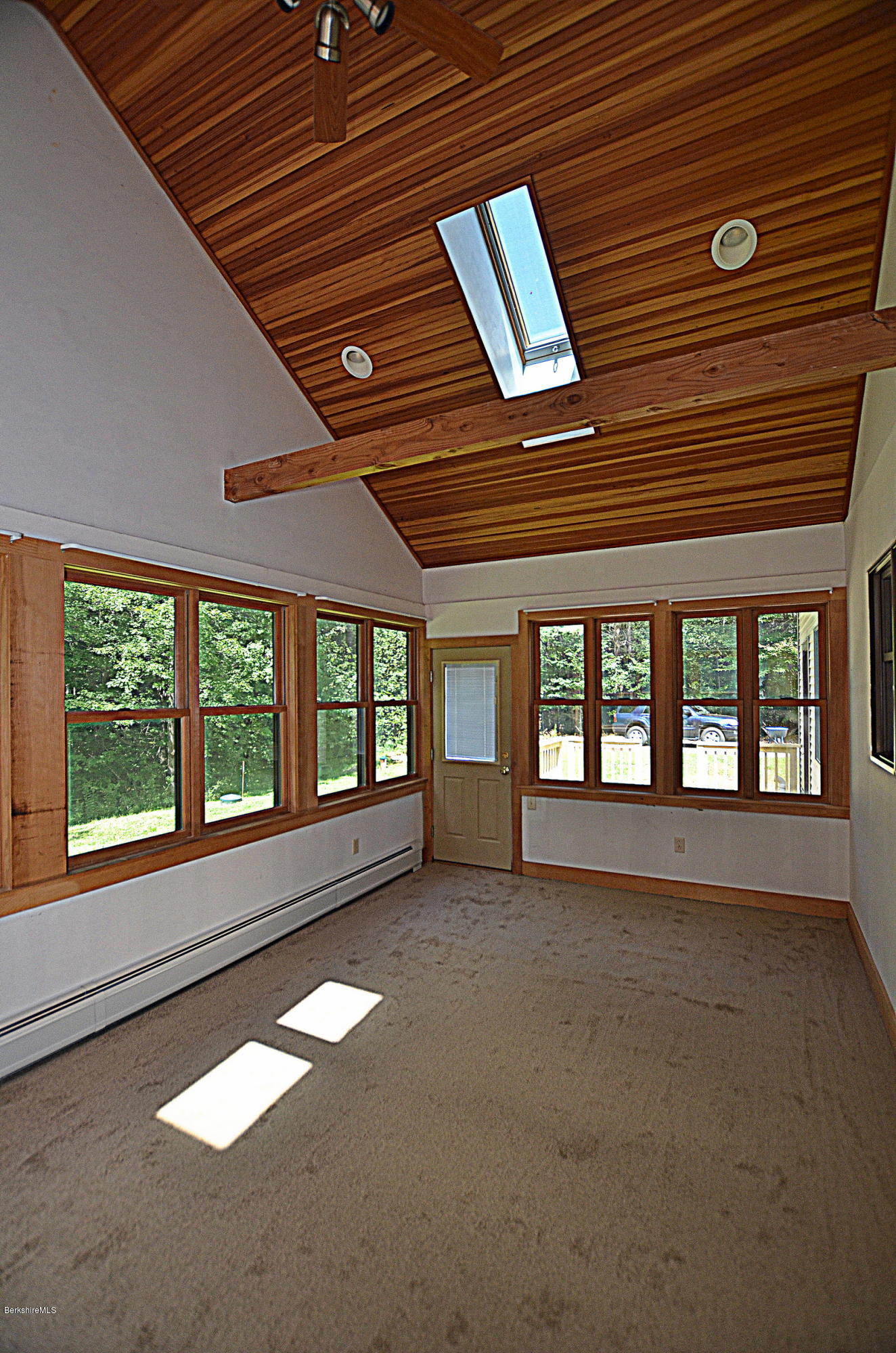 779 Stebbins Road Otis, MA 01253 - Photo 21 of 40 a view of an empty room with a balcony
