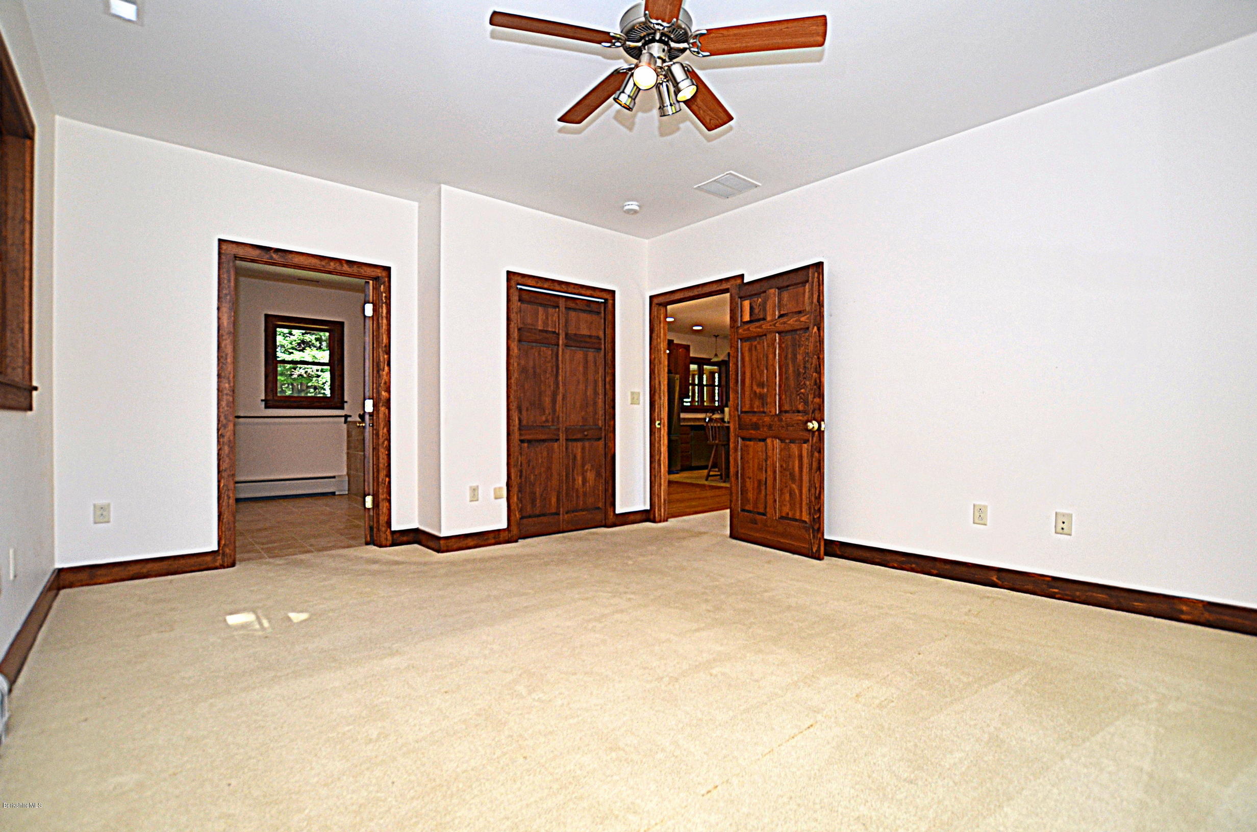 779 Stebbins Road Otis, MA 01253 - Photo 22 of 40 an empty room with closet and entryway