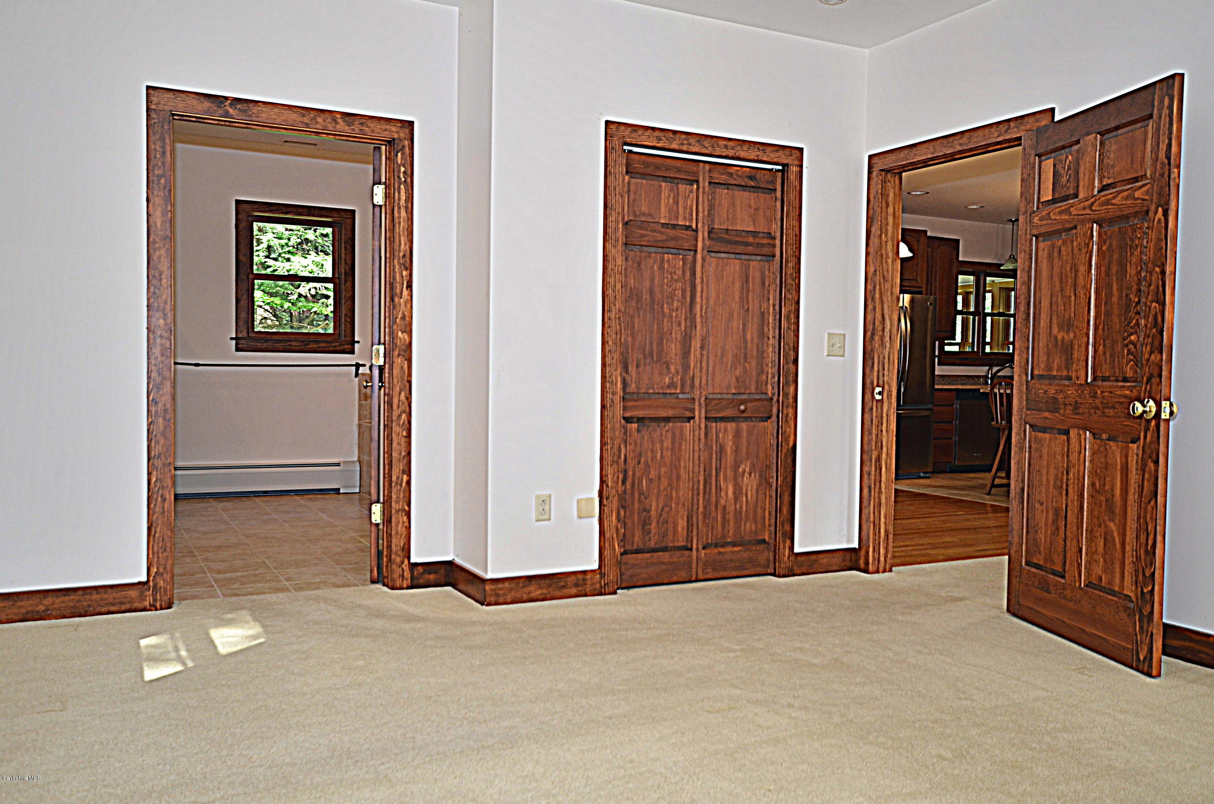 779 Stebbins Road Otis, MA 01253 - Photo 24 of 40 an empty room with closet and a window