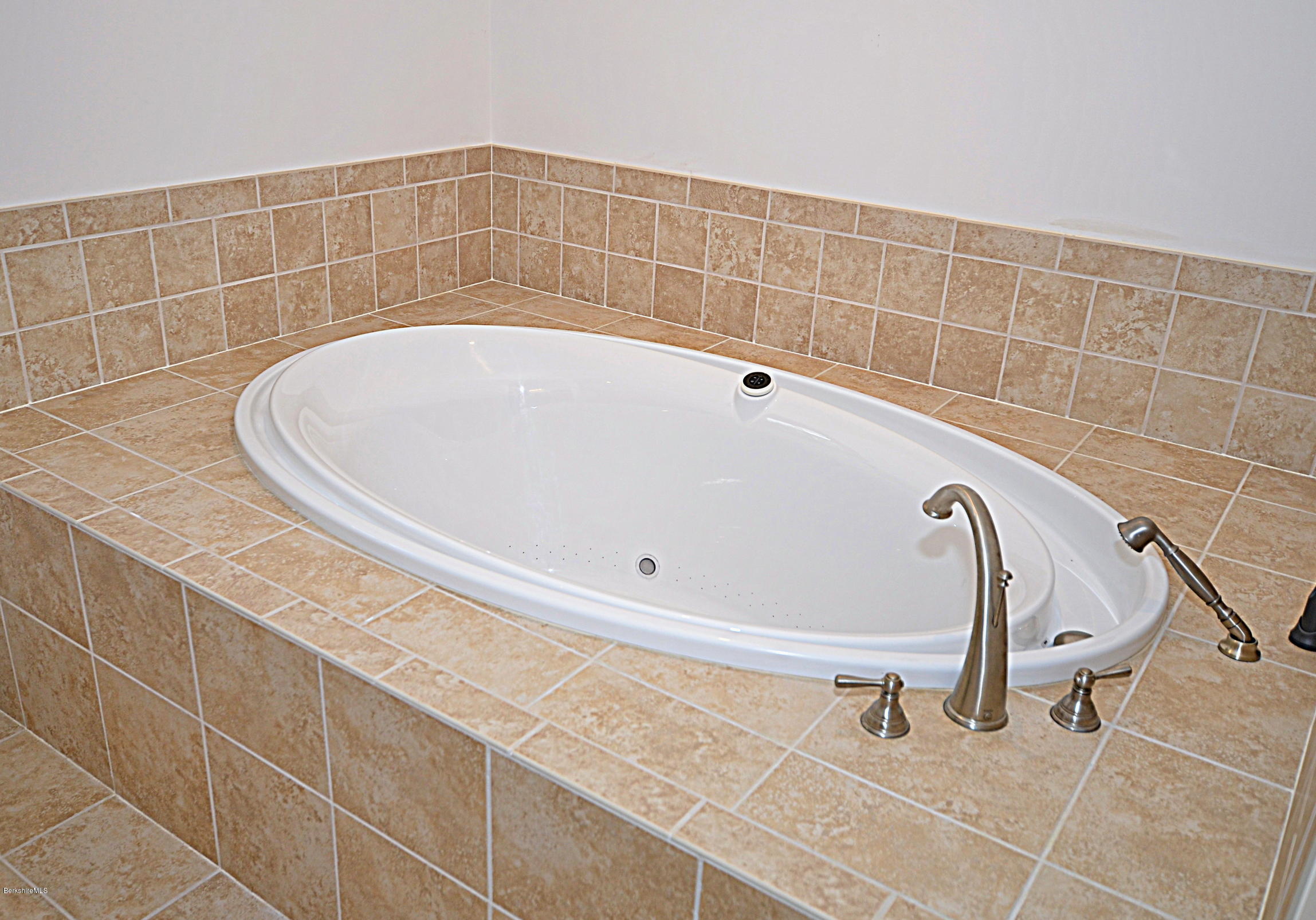 779 Stebbins Road Otis, MA 01253 - Photo 26 of 40 a bathroom with a bathtub