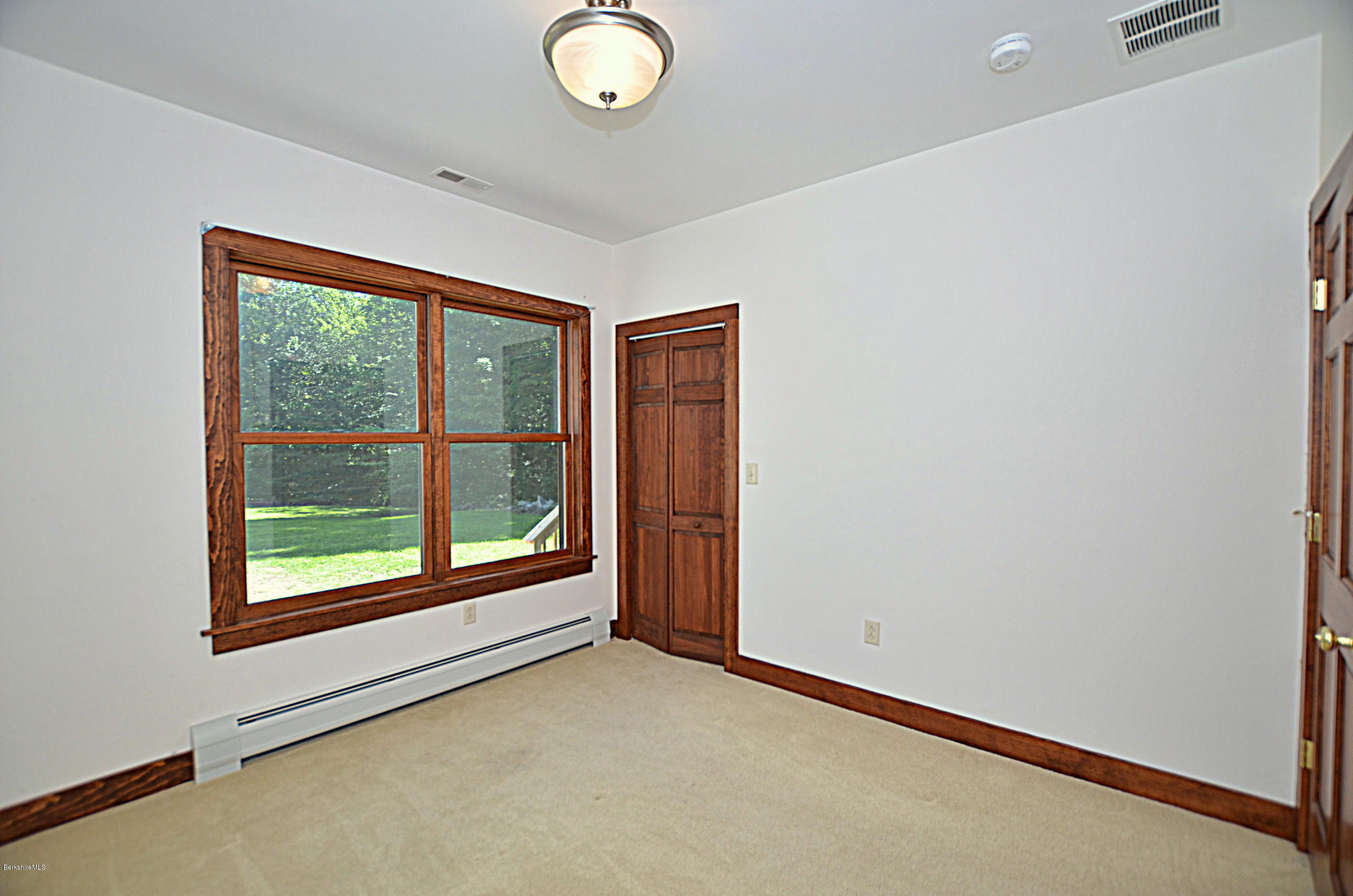 779 Stebbins Road Otis, MA 01253 - Photo 29 of 40 a view of an empty room with a window