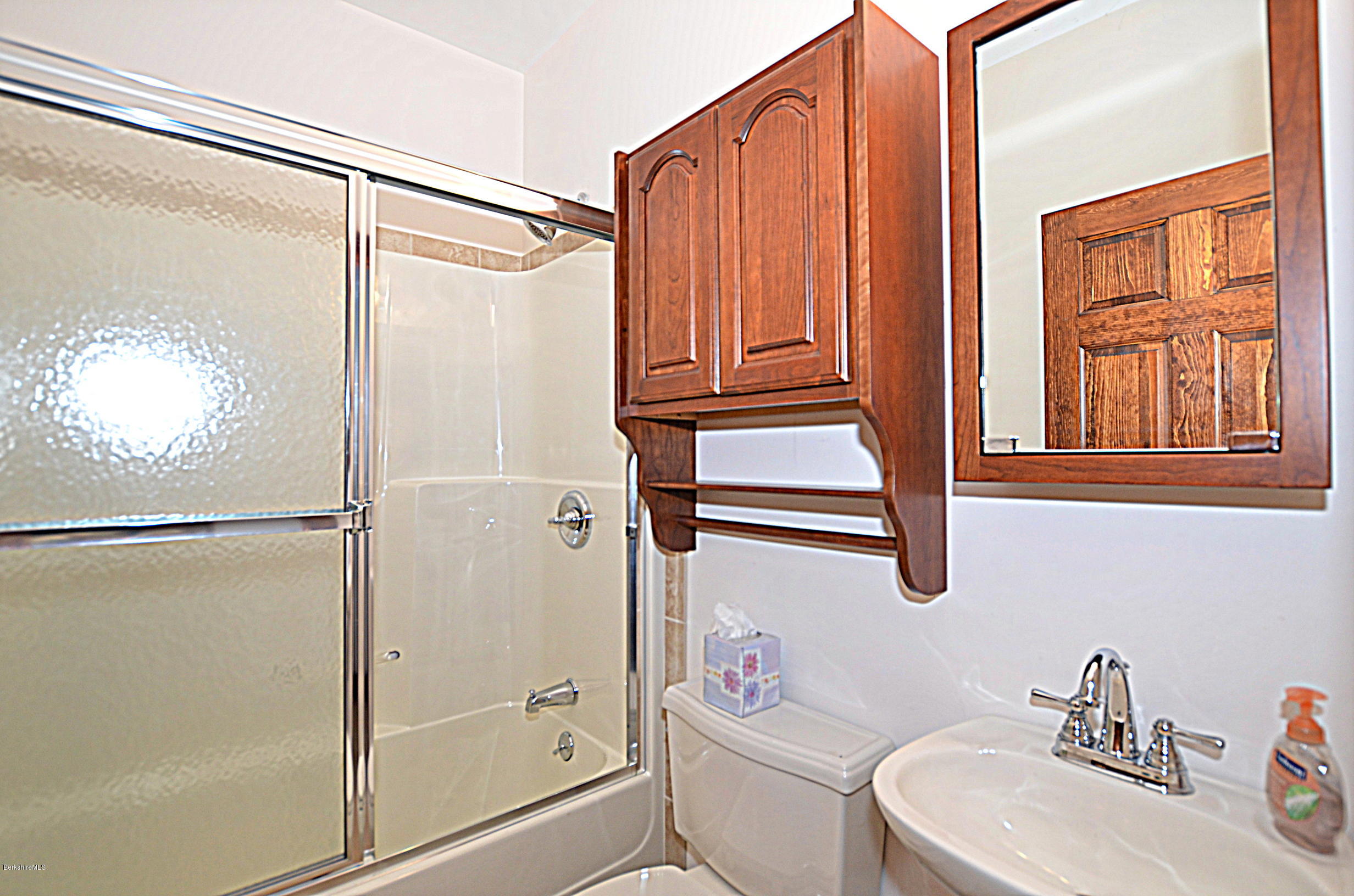 779 Stebbins Road Otis, MA 01253 - Photo 30 of 40 a bathroom with a shower a toilet and a sink